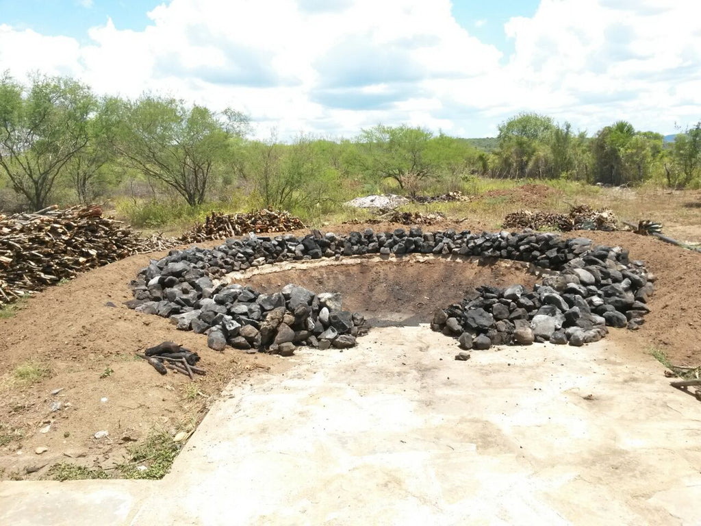 Conical Oven getting set up for cooking