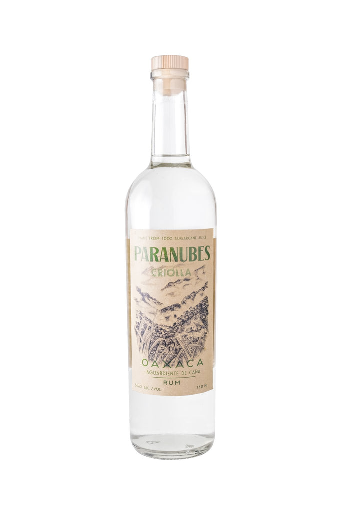 Bottle of Paranubes rum Criolla on a white background
